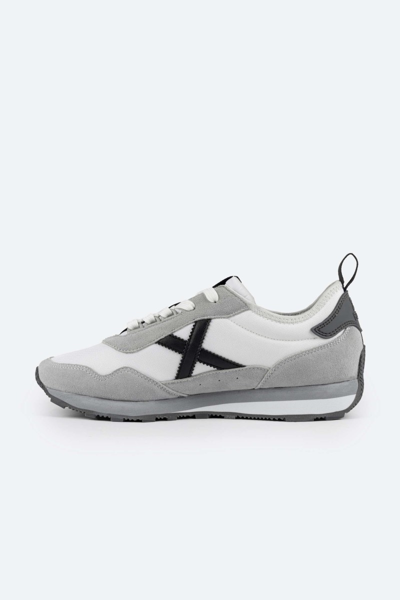 Zapatillas Munich UM : combinan el estilo retro con la comodidad moderna. Fabricadas con materiales de alta calidad y una suela antideslizante, son perfectas para cualquier ocasión.  2