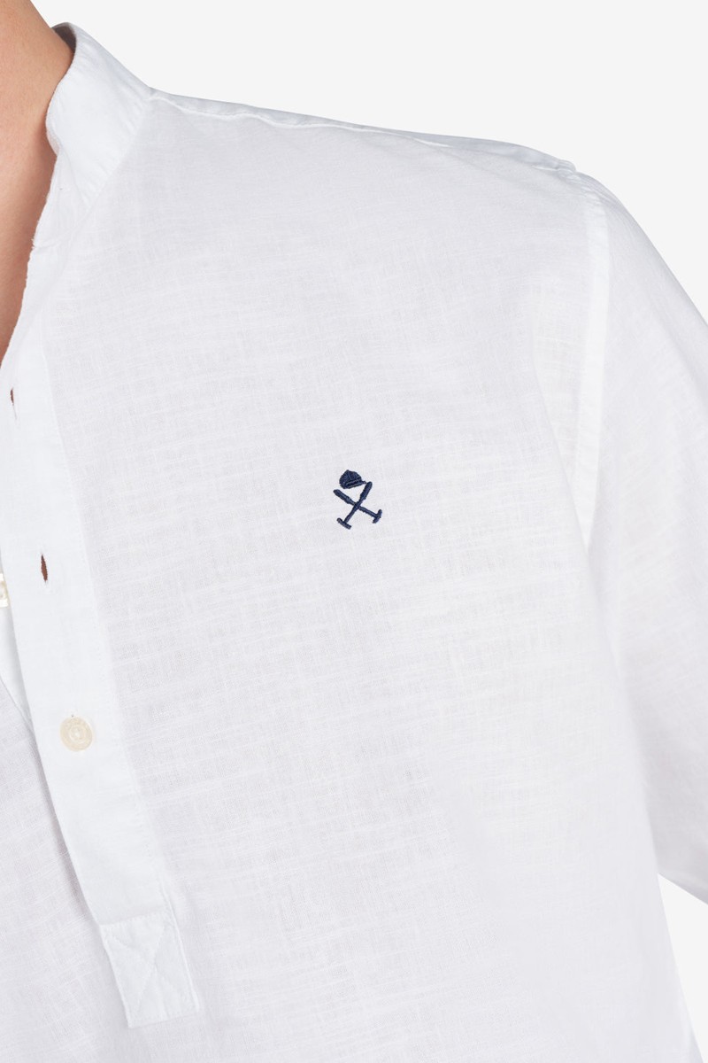   Polera Harper and Neyer Valley White : manga larga, cuello mao y estilo elegante. Ideal para looks frescos y sofisticados. 