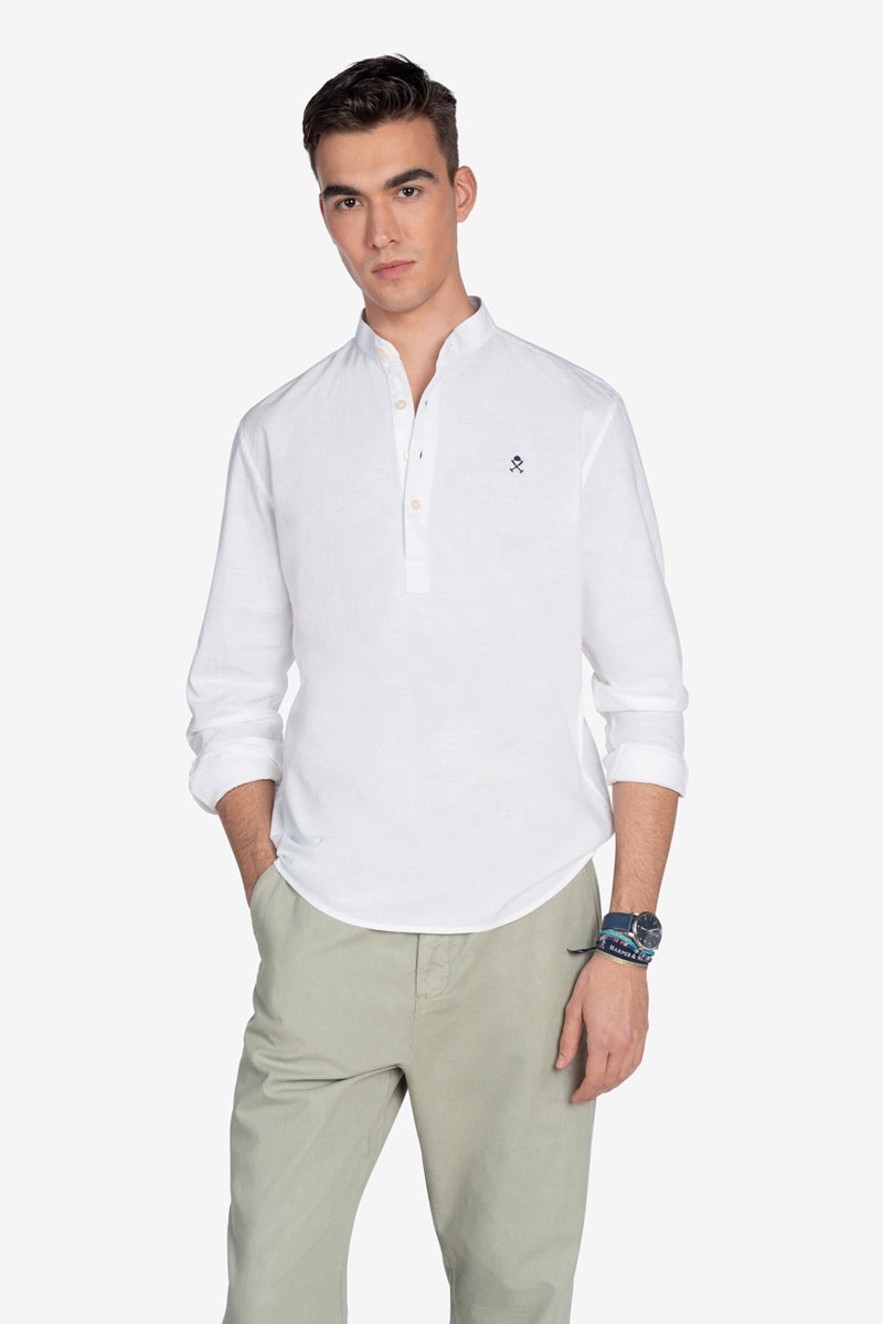   Polera Harper and Neyer Valley White : manga larga, cuello mao y estilo elegante. Ideal para looks frescos y sofisticados. 