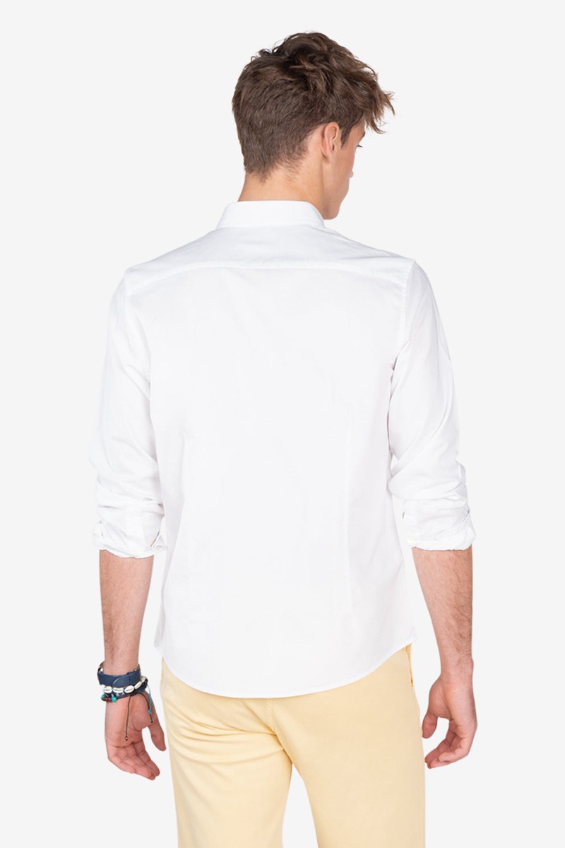   Camisa Harper and Neyer Icon White : diseño clásico, algodón 100% y bordado en el pecho. Un básico elegante para cualquier ocasión. 