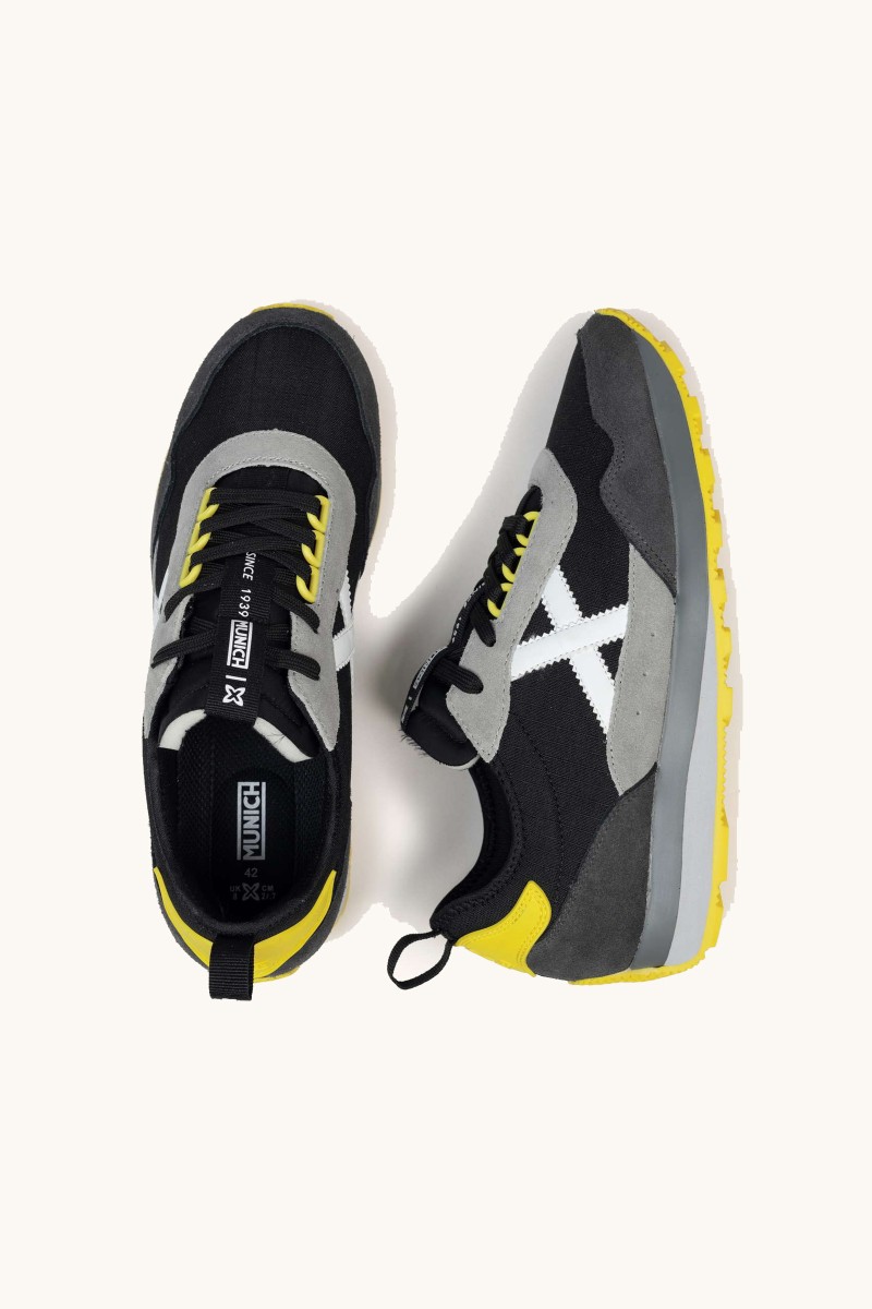  Zapatilla de Munich con diseño vintage y perfil setentero. Ideal para marcar estilo dentro y fuera del asfalto. 