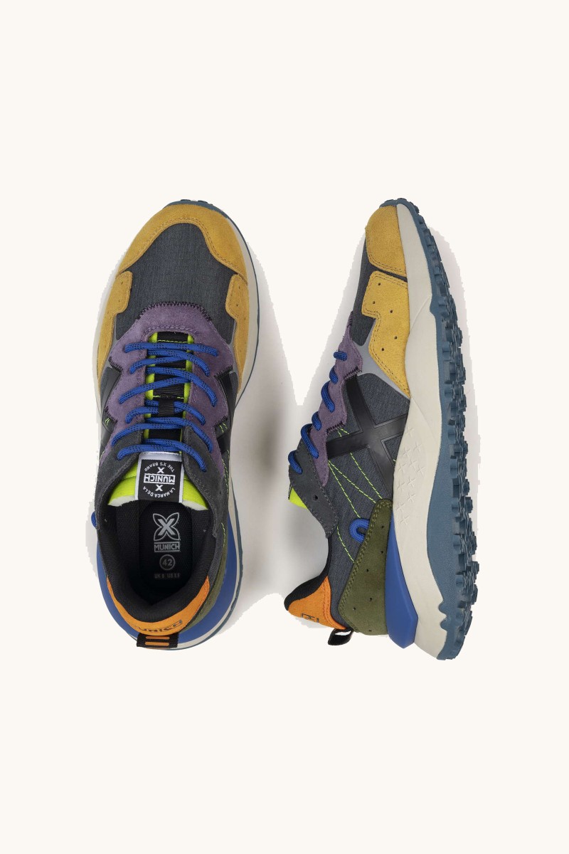  Zapatilla de Munich con suela chunky, diseño estructurado y estilo deportivo adaptado al ritmo urbano. 