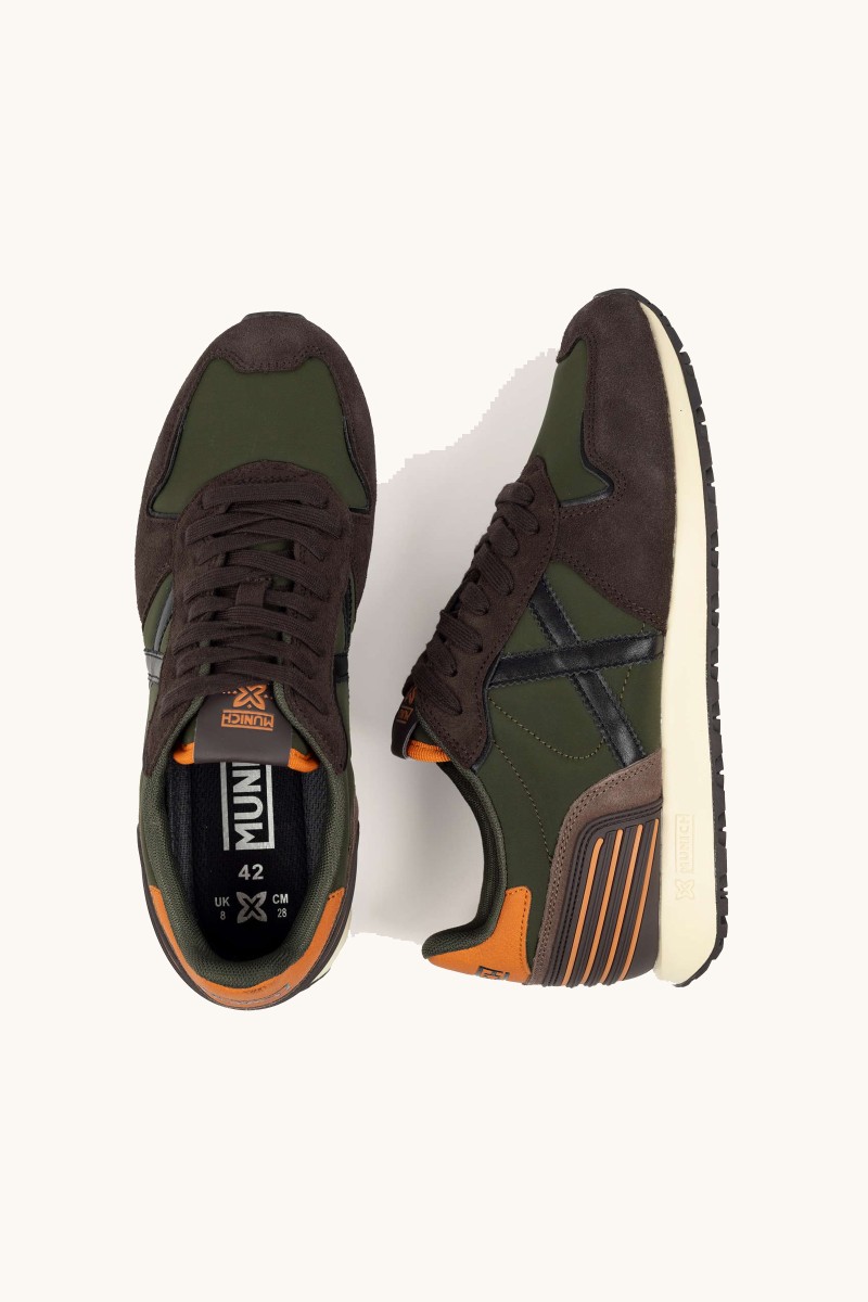  Zapatilla de Munich con diseño inspirado en la marcha atlética, reedición de un clásico con alma retro y estilo urbano. 