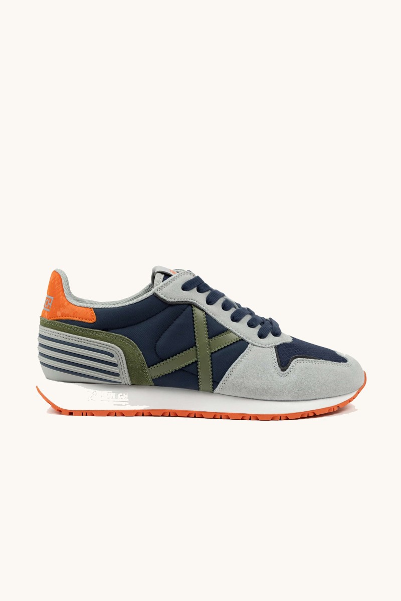 Zapatilla Munich de estilo retro running inspirada en la marcha atlética, con diseño cómodo y look atemporal.