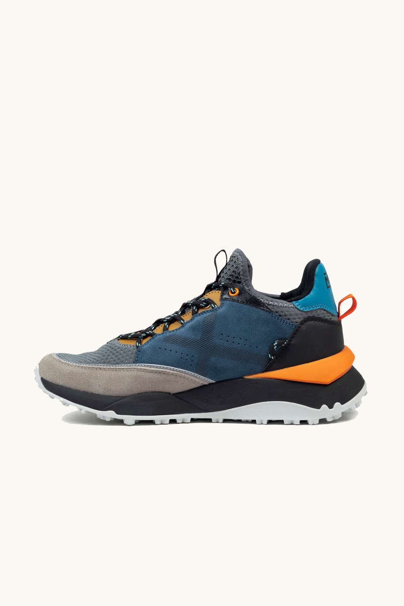 Zapatilla Munich con esencia deportiva y detalles modernos. Dinamismo y elegancia para tu día a día.  2
