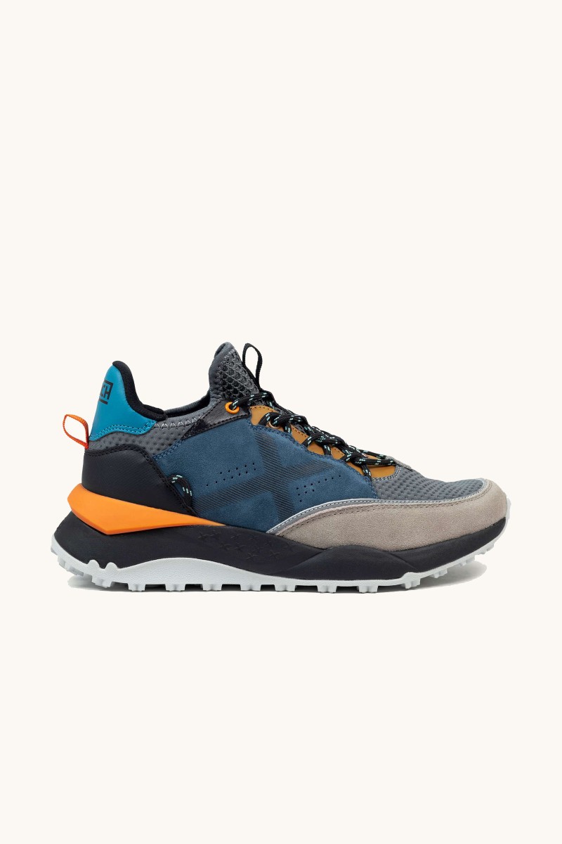 Zapatilla Munich con esencia deportiva y detalles modernos. Dinamismo y elegancia para tu día a día.