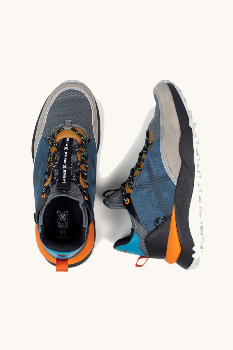  Zapatilla Munich con esencia deportiva y detalles modernos. Dinamismo y elegancia para tu día a día. 