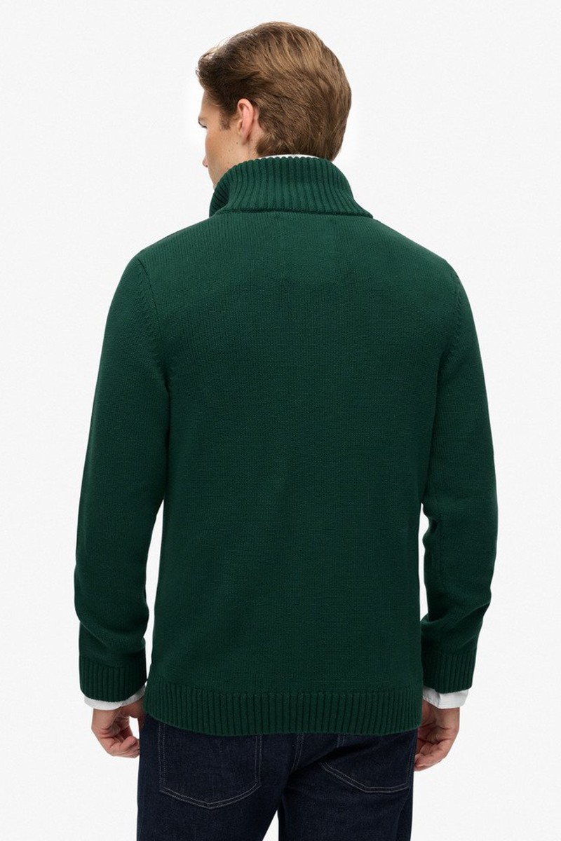 Jersey de punto suave con cuello alto y media cremallera, ideal para un estilo casual y sofisticado a la vez.  2