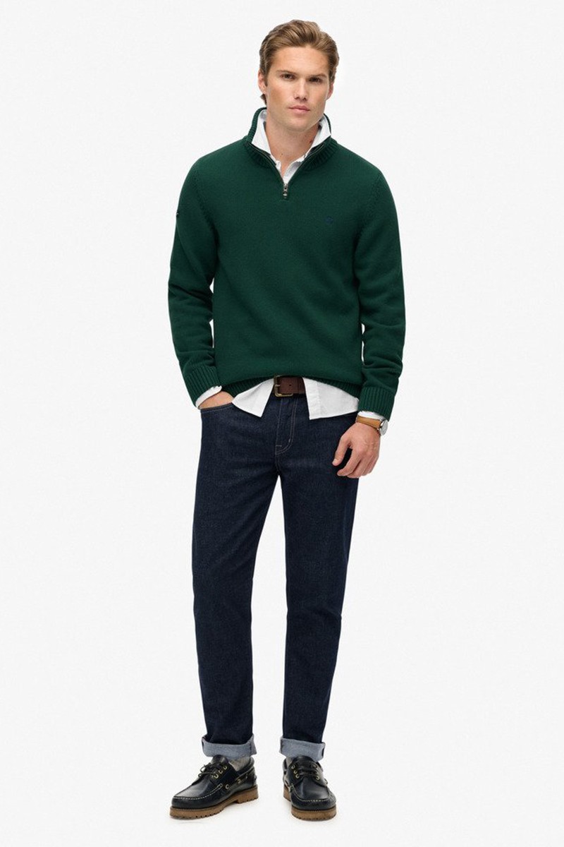  Jersey de punto suave con cuello alto y media cremallera, ideal para un estilo casual y sofisticado a la vez. 