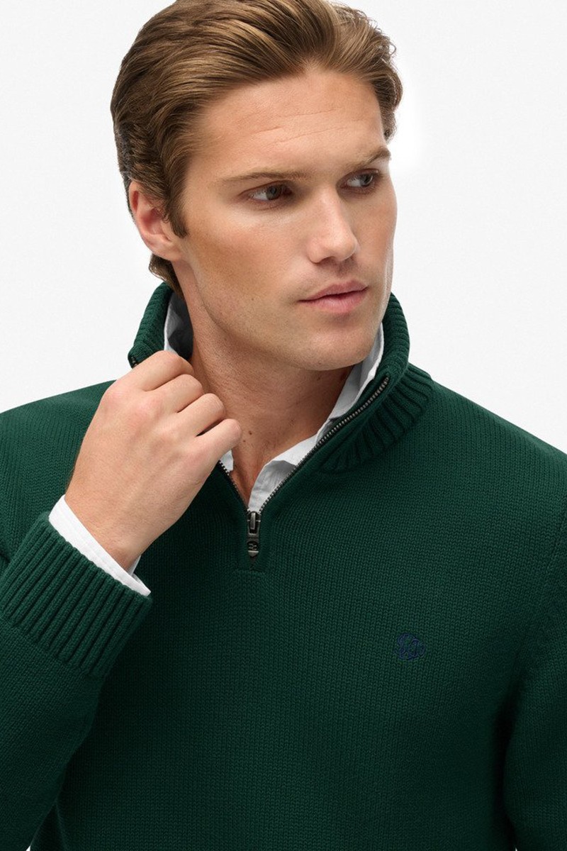  Jersey de punto suave con cuello alto y media cremallera, ideal para un estilo casual y sofisticado a la vez. 