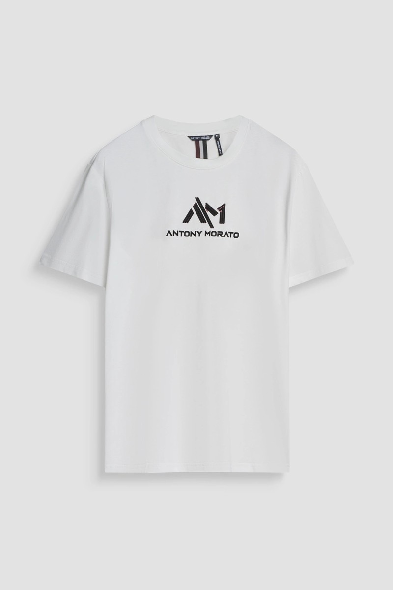  Camiseta Antony Morato en algodón 100 % con corte regular y logotipo frontal en efecto aterciopelado, ideal para un look casual con carácter. 