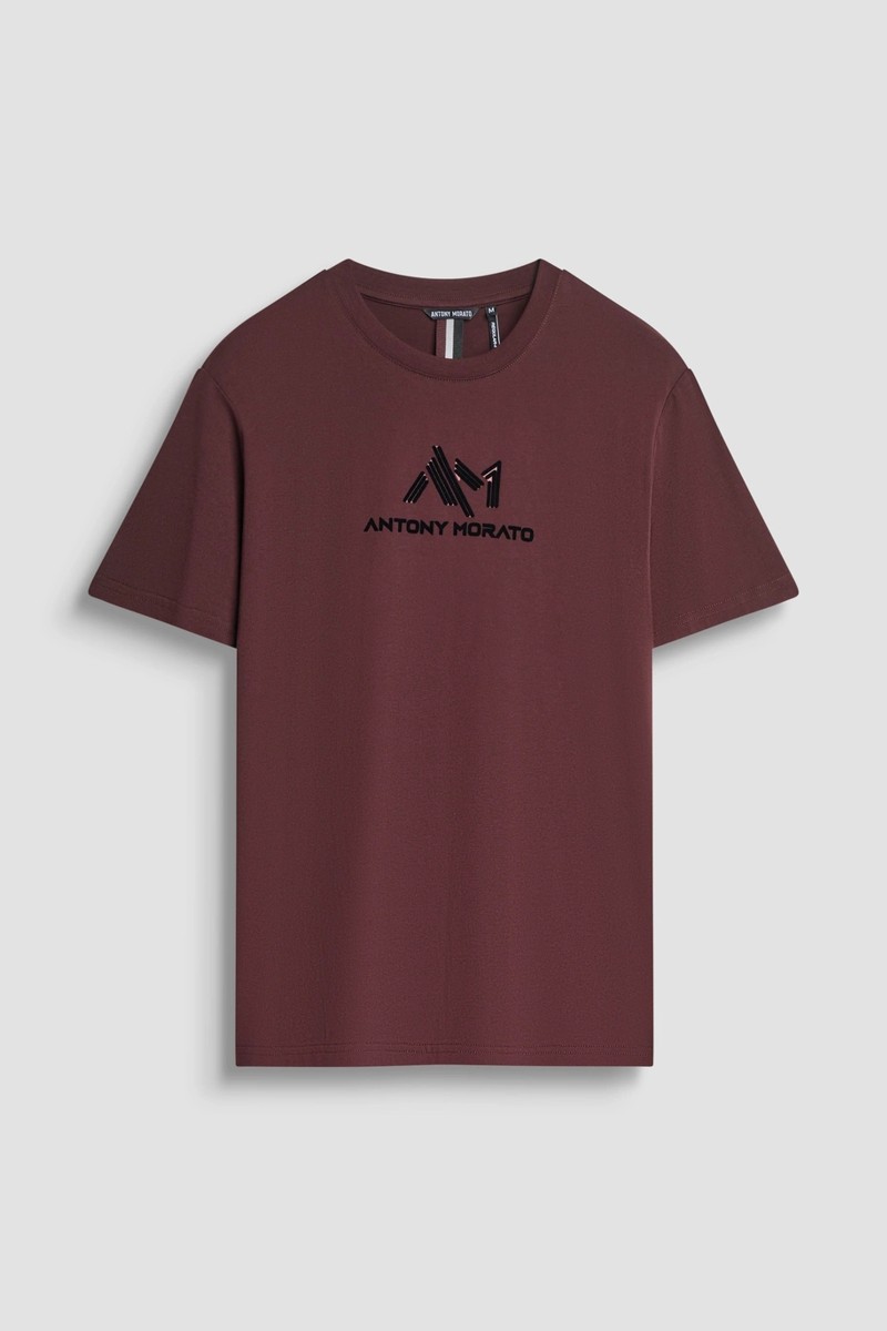  Camiseta Antony Morato en algodón 100 % con corte regular y logotipo frontal en efecto aterciopelado, ideal para un look casual con carácter. 