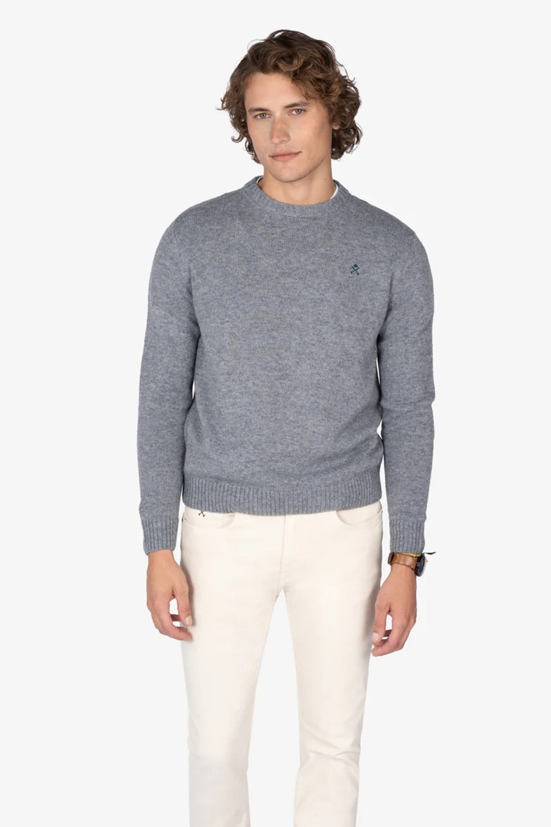  Jersey de cuello redondo en mezcla de tejidos con logo bordado en el pecho y acabados en canalé, ideal para un look urbano con toque clásico. 