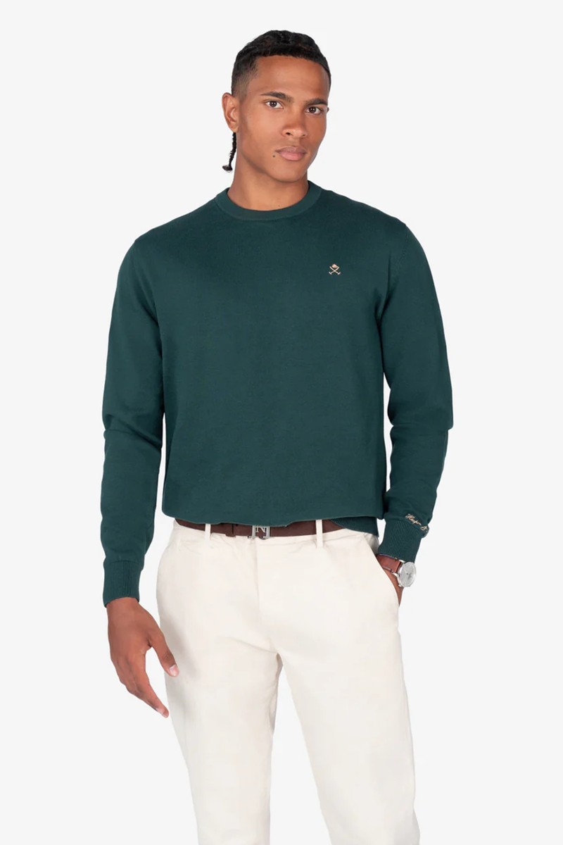 Jersey de cuello redondo en algodón 100 % con corte regular y diseño limpio, perfecto para looks casuales con estilo.
