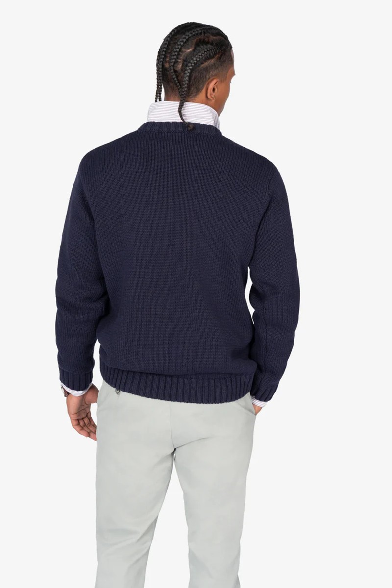 KNT HARPER M20  Jersey de punto en algodón con diseño gráfico de bandera y calavera, corte Regular Fit y acabado de calidad para un look casual con actitud.