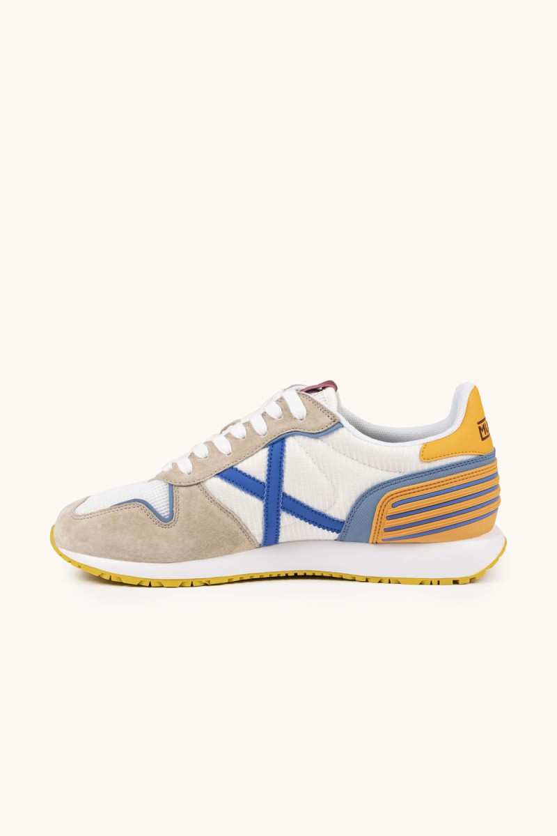  Zapatillas Munich Massana Club con diseño retro, mezcla de materiales y suela dentada. Estilo urbano cómodo y con personalidad. 