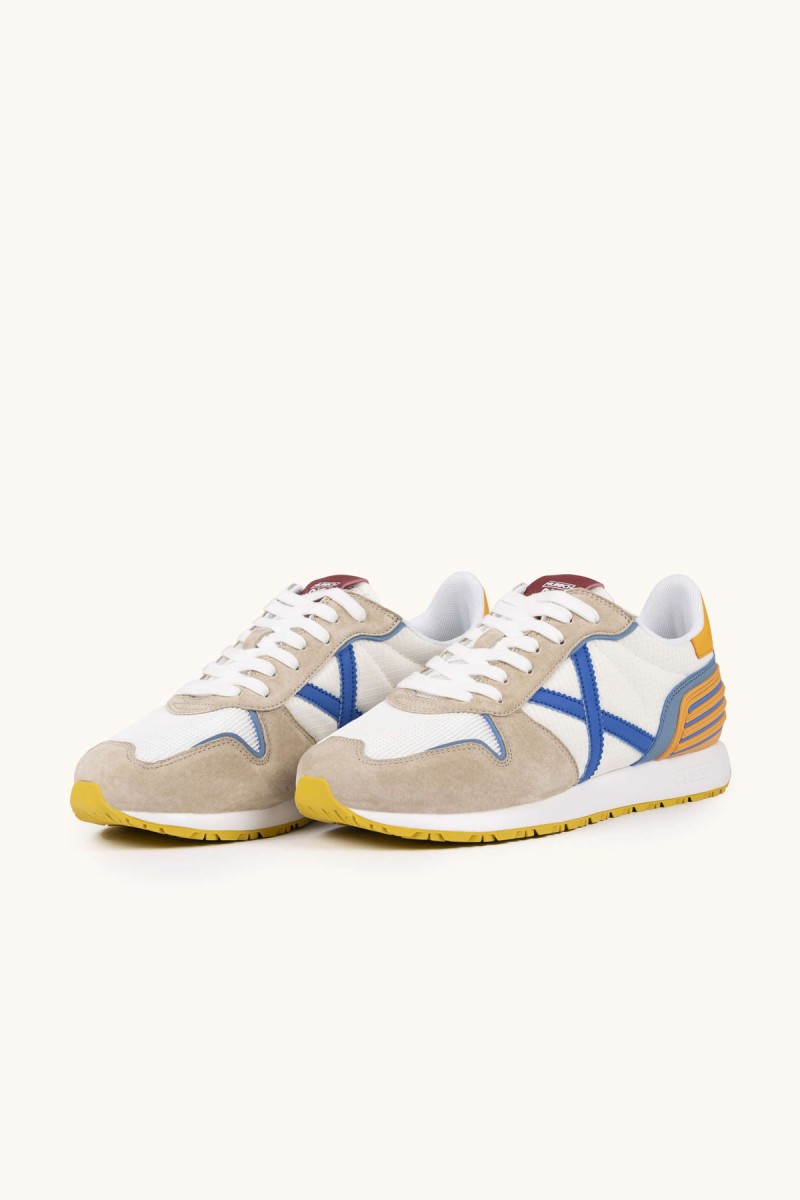  Zapatillas Munich Massana Club con diseño retro, mezcla de materiales y suela dentada. Estilo urbano cómodo y con personalidad. 