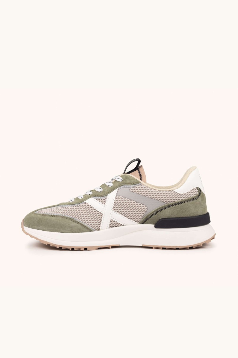  Zapatillas Munich con diseño moderno y colores vibrantes, ideales para looks urbanos cómodos con personalidad y estilo diario. 