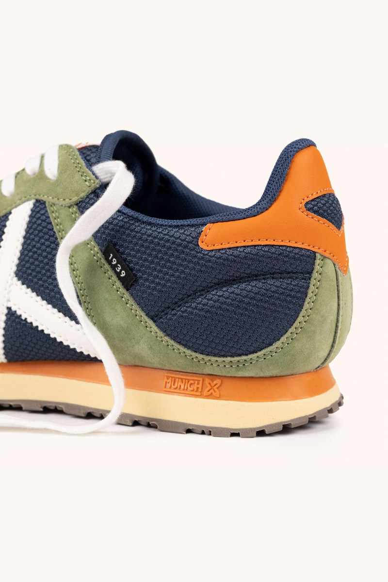  Zapatillas Munich en verde oliva y navy con estilo retro, perfectas para looks urbanos cómodos y con personalidad. 