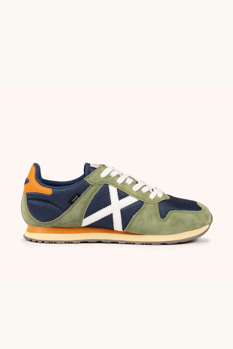  Zapatillas Munich en verde oliva y navy con estilo retro, perfectas para looks urbanos cómodos y con personalidad. 