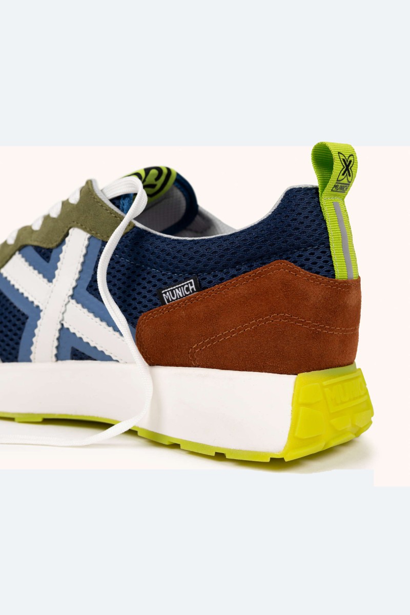  Zapatillas Munich en azul, verde y marrón con estilo deportivo elegante, ideales para looks urbanos cómodos y con personalidad. 