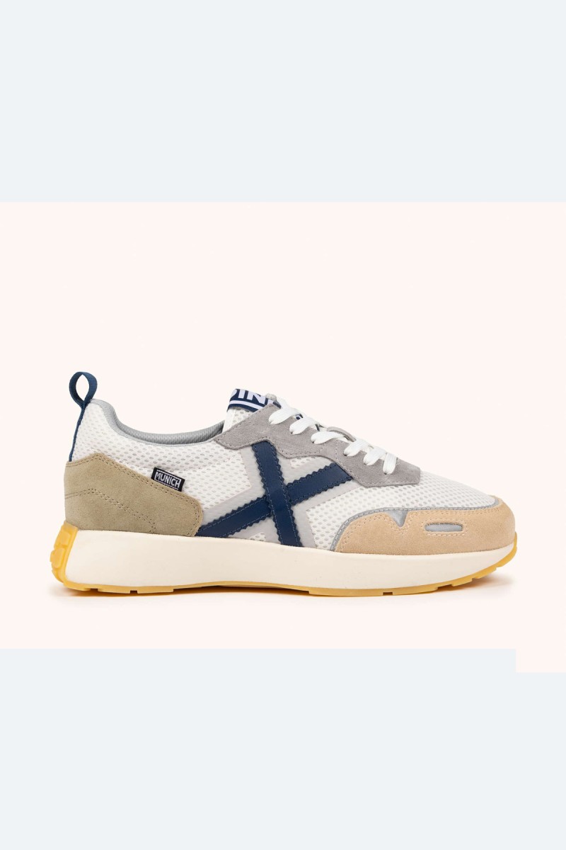  Zapatillas Munich en blanco, gris y azul con estilo deportivo elegante, ideales para looks urbanos cómodos y versátiles. 