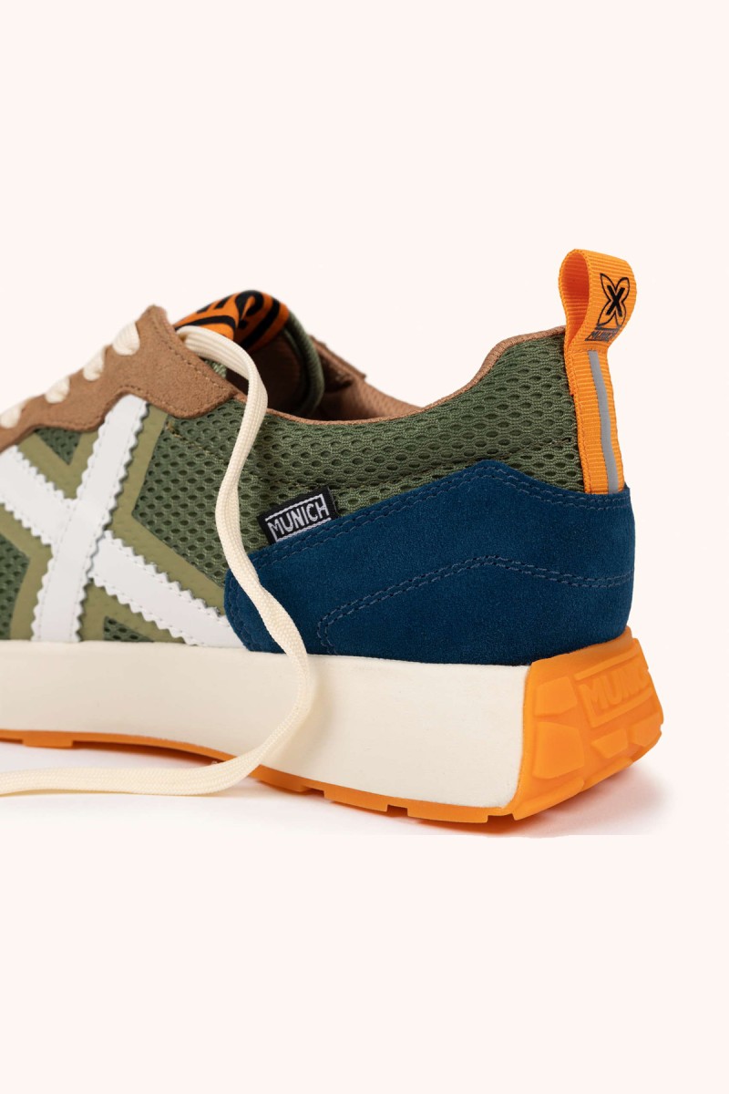  Zapatillas Munich en verde, marrón y azul con estilo deportivo elegante, ideales para looks urbanos cómodos y con personalidad. 