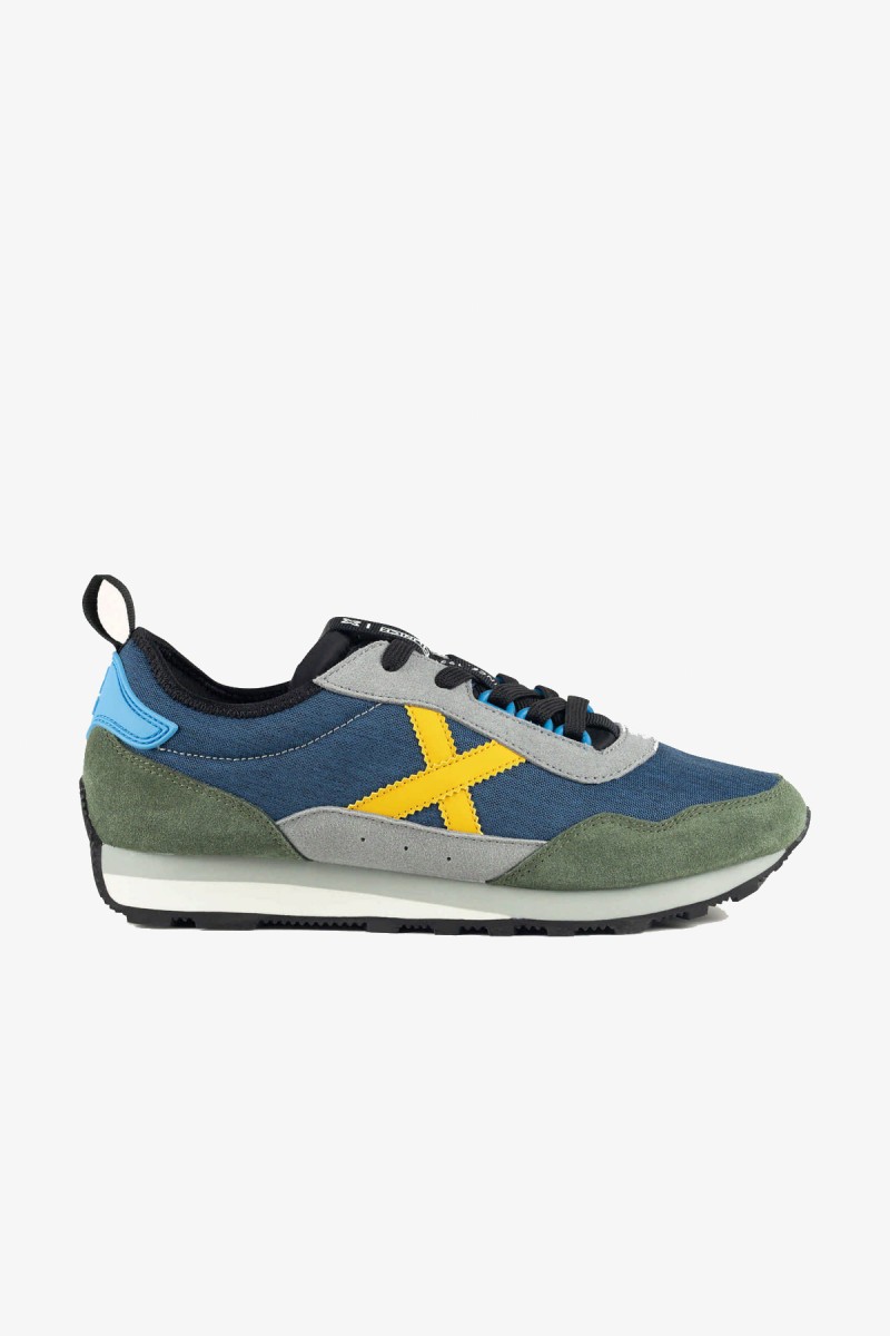  Zapatillas Munich de inspiración retro que recuperan la esencia de las siluetas clásicas de la marca. Una opción versátil para completar looks urbanos, casuales y business casual. 