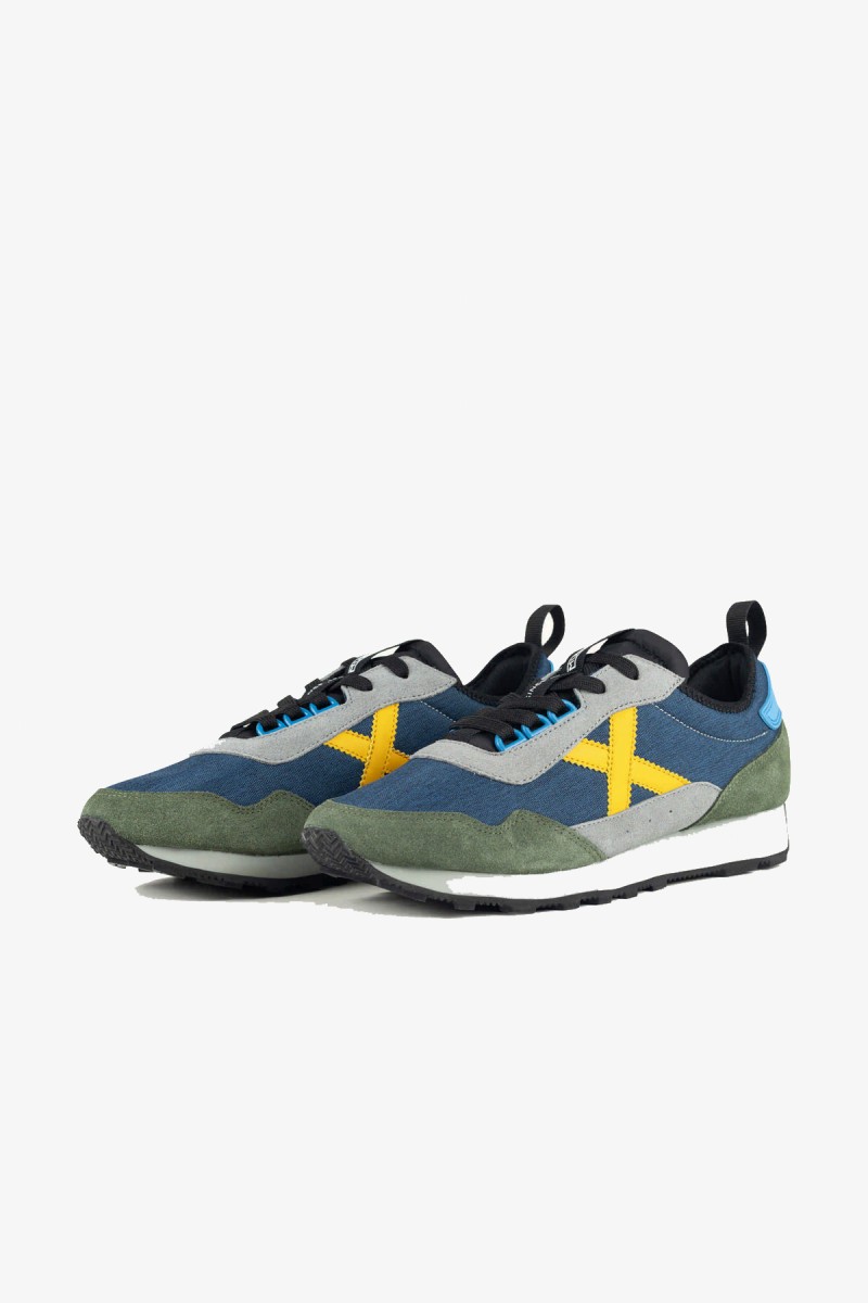  Zapatillas Munich de inspiración retro que recuperan la esencia de las siluetas clásicas de la marca. Una opción versátil para completar looks urbanos, casuales y business casual. 