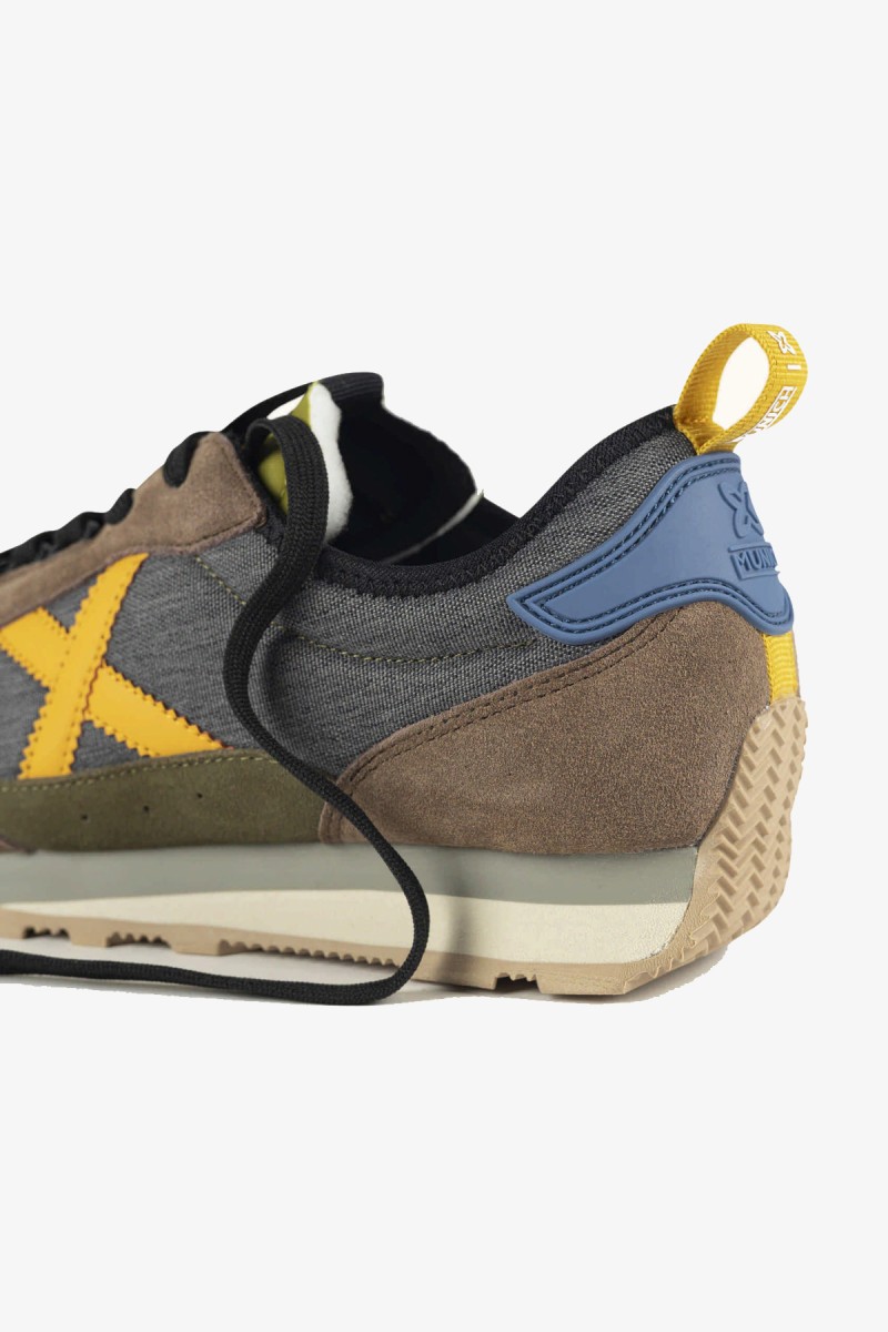  Zapatillas Munich de inspiración retro que recuperan la esencia de las siluetas clásicas de la marca. Una opción versátil para completar looks urbanos, casuales y business casual.  2