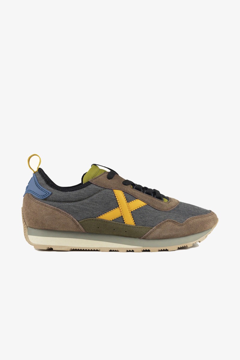  Zapatillas Munich de inspiración retro que recuperan la esencia de las siluetas clásicas de la marca. Una opción versátil para completar looks urbanos, casuales y business casual. 