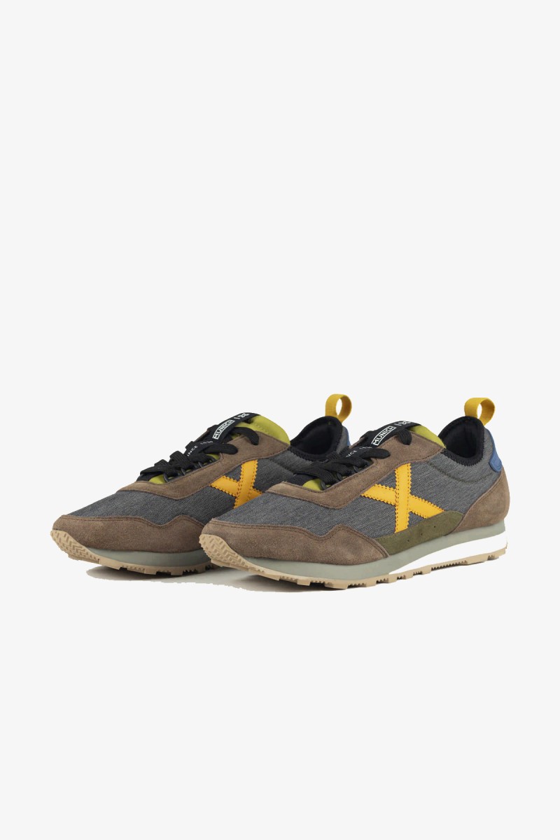  Zapatillas Munich de inspiración retro que recuperan la esencia de las siluetas clásicas de la marca. Una opción versátil para completar looks urbanos, casuales y business casual. 