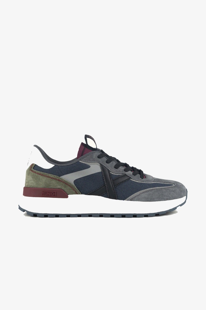  Zapatillas Munich de estética contemporánea con una cuidada combinación de texturas y colores. Su diseño urbano y suela de perfil robusto permiten integrarlas fácilmente en looks casuales y más cuidados. 
