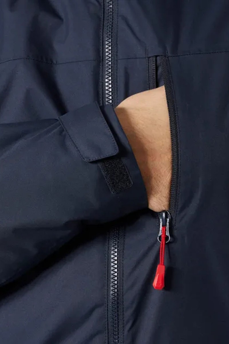  Chaqueta Helly Hansen para hombre impermeable, cortavientos y transpirable. Combina HELLY TECH® Protection, forro polar Polartec® y aislamiento sintético para ofrecer protección y comodidad tanto en actividades náuticas como en el día a día. 